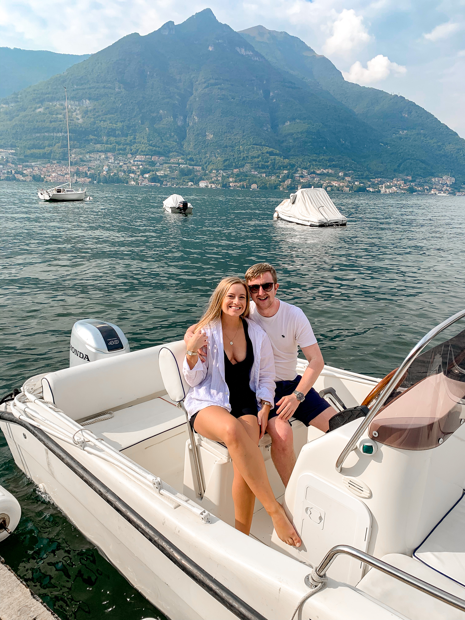 Lake como boat couple